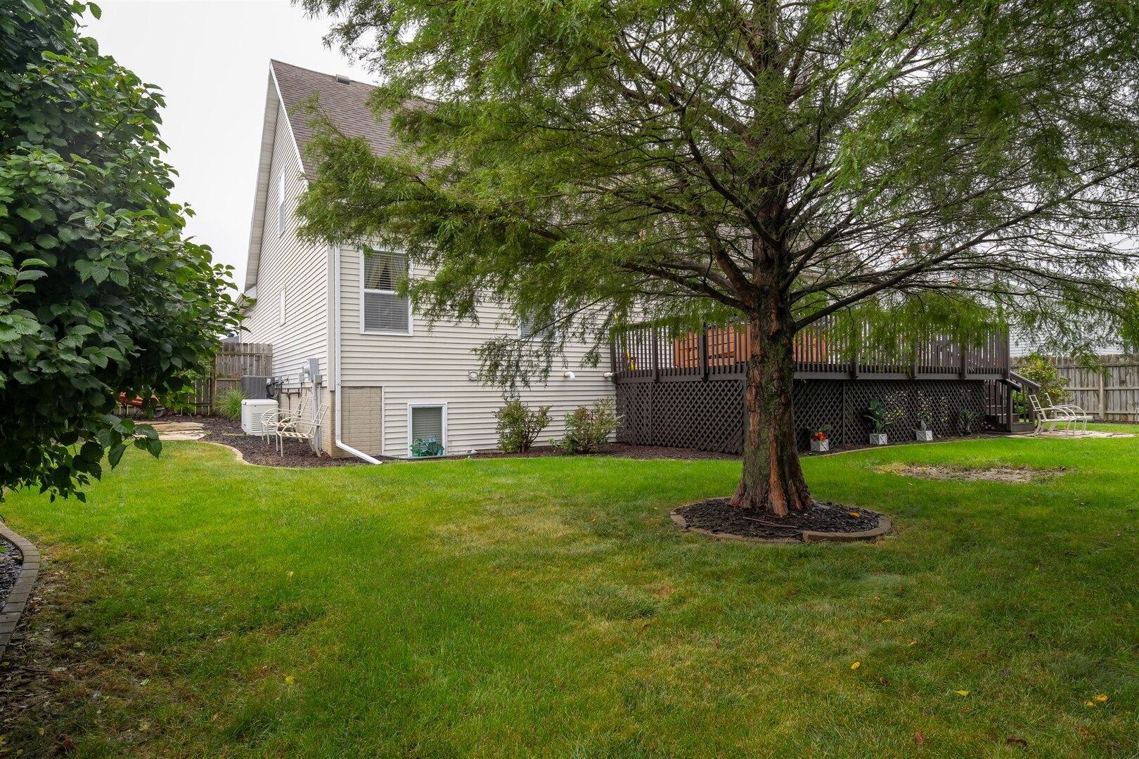 20 Fedor Circle Bloomington, IL 61705 - Photo 35 of 51 a view of a house with a backyard
