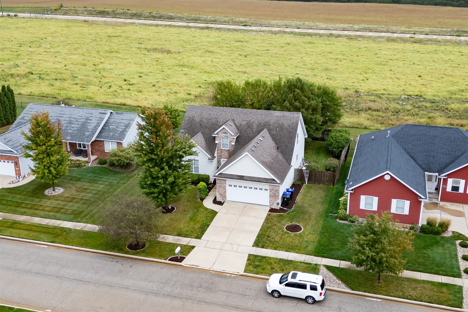 20 Fedor Circle Bloomington, IL 61705 - Photo 5 of 51 an aerial view of ocean with residential house and ocean view