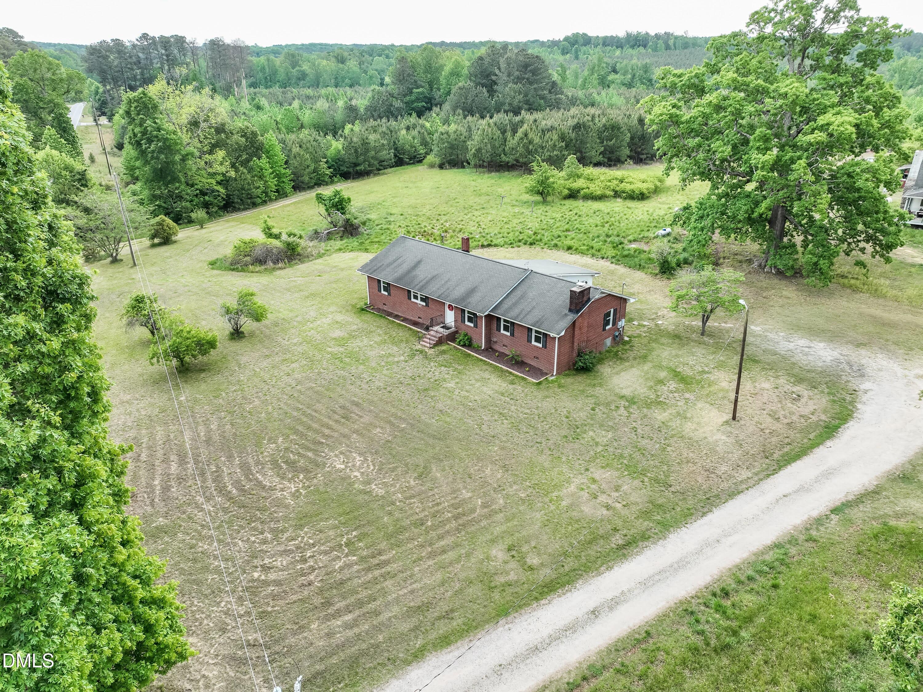 641 Rocky Ford Road Louisburg, NC 27549 - Photo 36 of 38 a view of a yard with an outdoor space