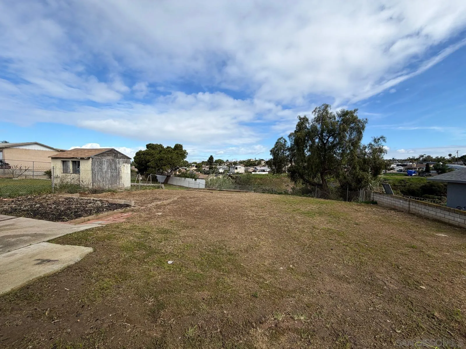 2959 Ridgeway Drive National City, CA 91950 - Photo 11 of 12 a view of a house with a yard