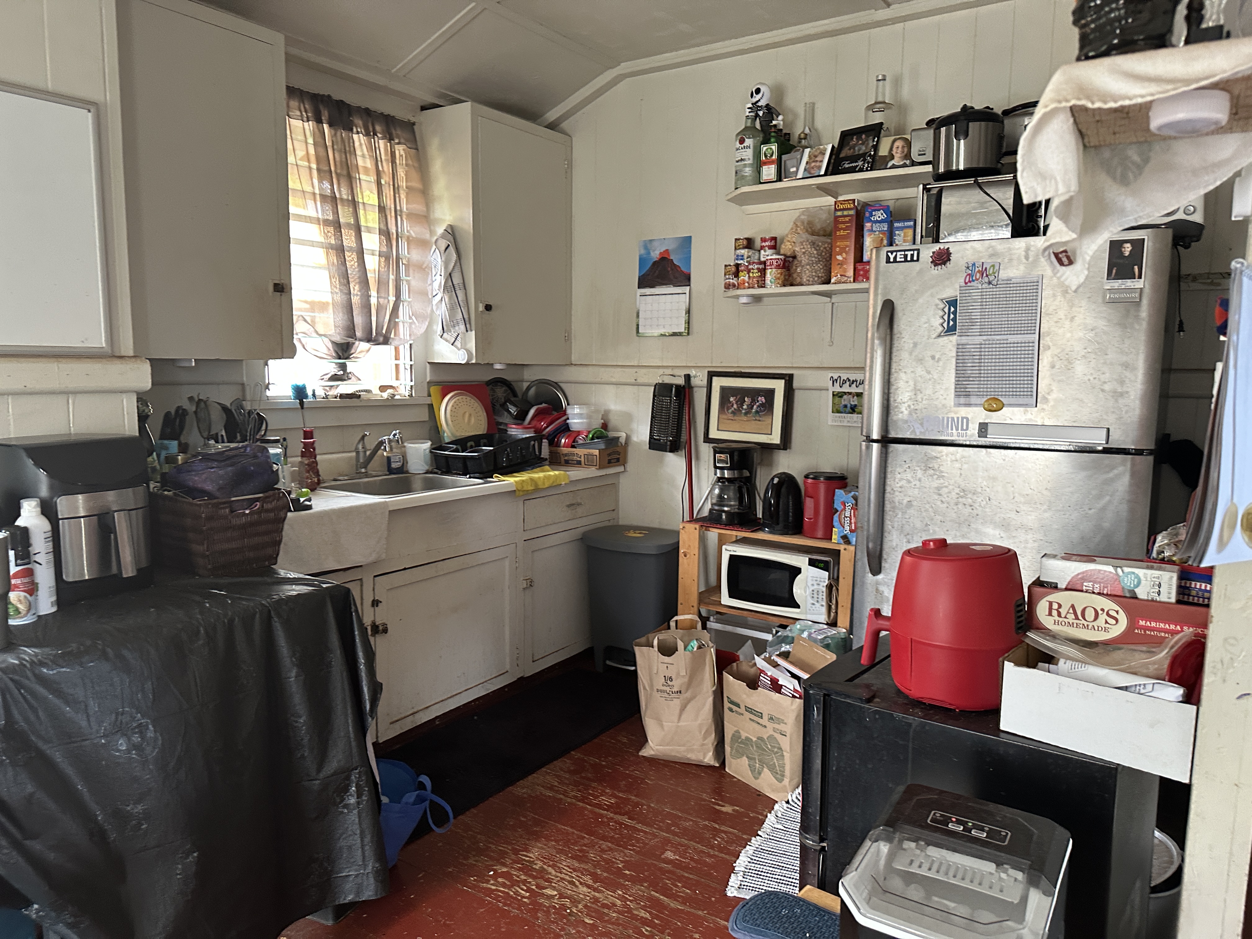 4587 Kala Road Kekaha, HI 96752 - Photo 9 of 19 a room with furniture a rug toys and a window