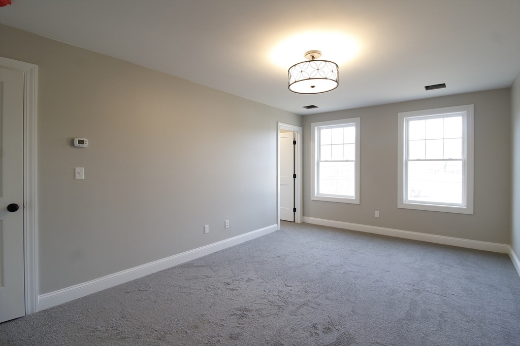 2989 Sharps Road Dighton, MA 02715 - Photo 11 of 19 a view of an empty room with a window