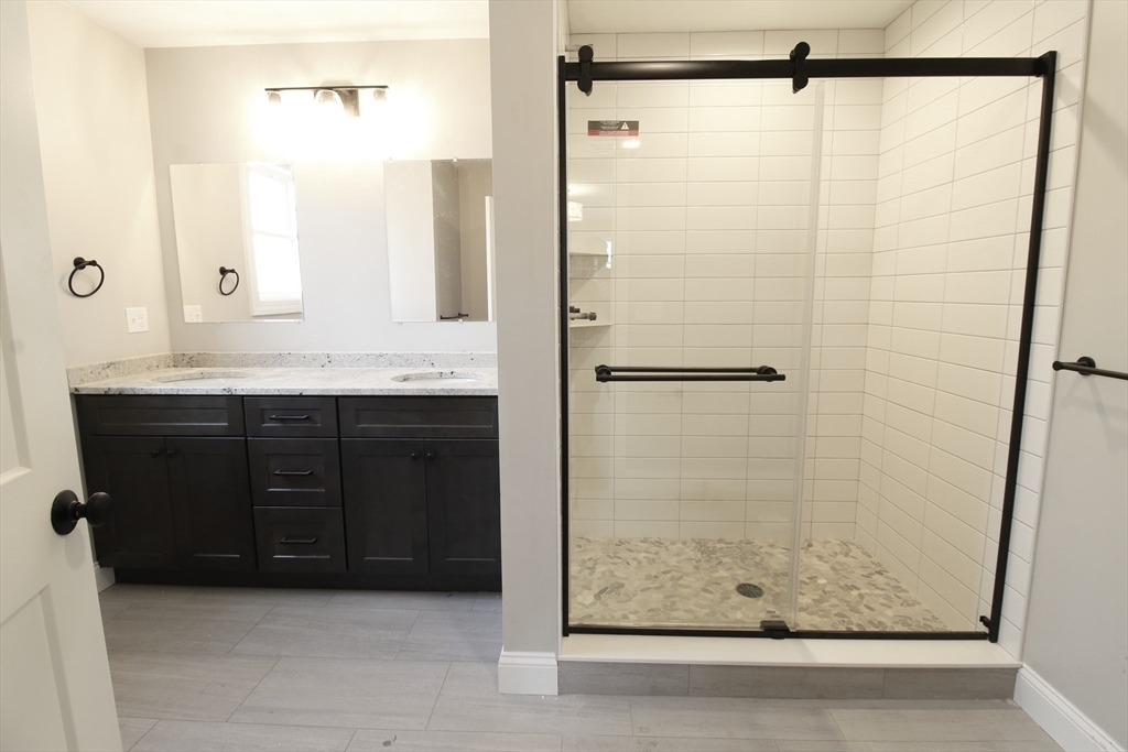 2989 Sharps Road Dighton, MA 02715 - Photo 12 of 19 a bathroom with a shower and a sink