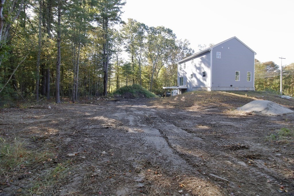 2989 Sharps Road Dighton, MA 02715 - Photo 18 of 19 a view of a backyard with large trees