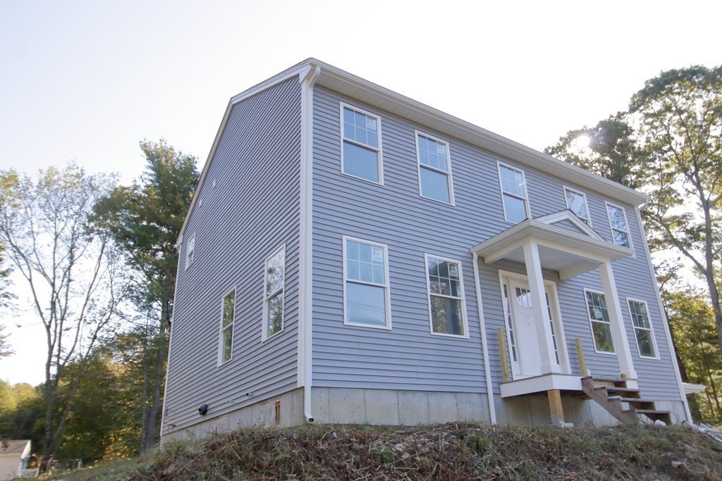 2989 Sharps Road Dighton, MA 02715 - Photo 19 of 19 a front view of a house with a yard