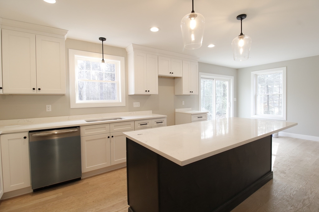 2989 Sharps Road Dighton, MA 02715 - Photo 4 of 19 a kitchen with sink cabinets and window