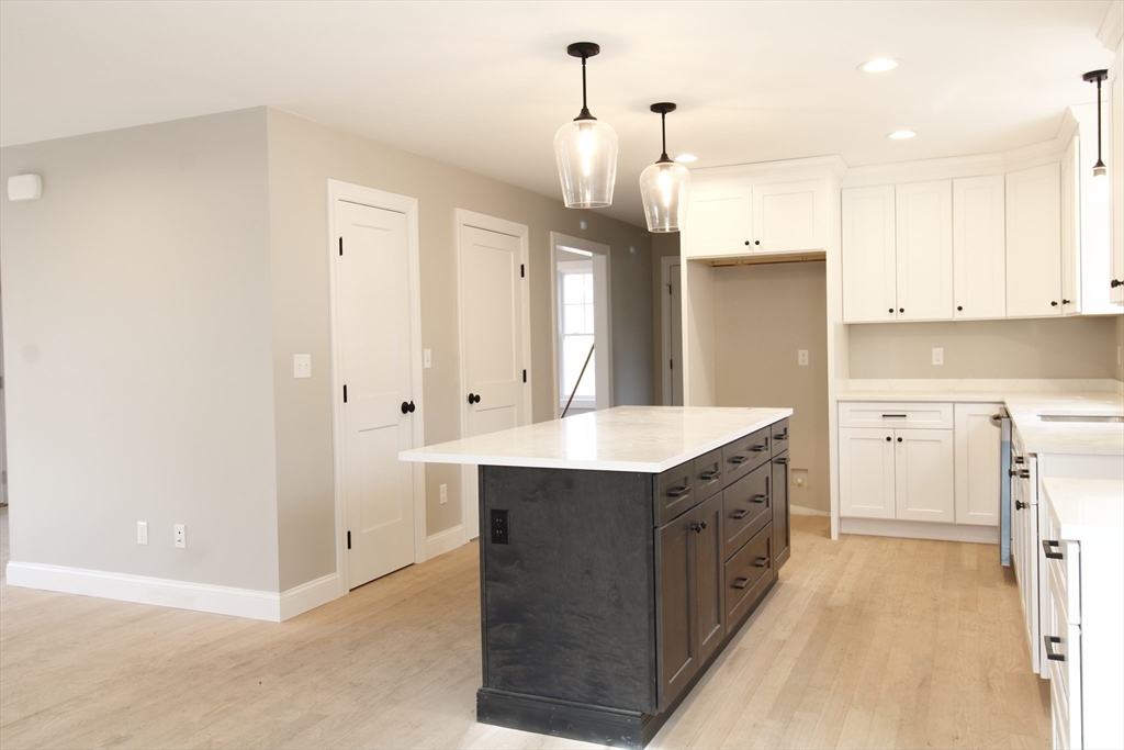 2989 Sharps Road Dighton, MA 02715 - Photo 5 of 19 a kitchen with stainless steel appliances granite countertop a sink a stove and a refrigerator