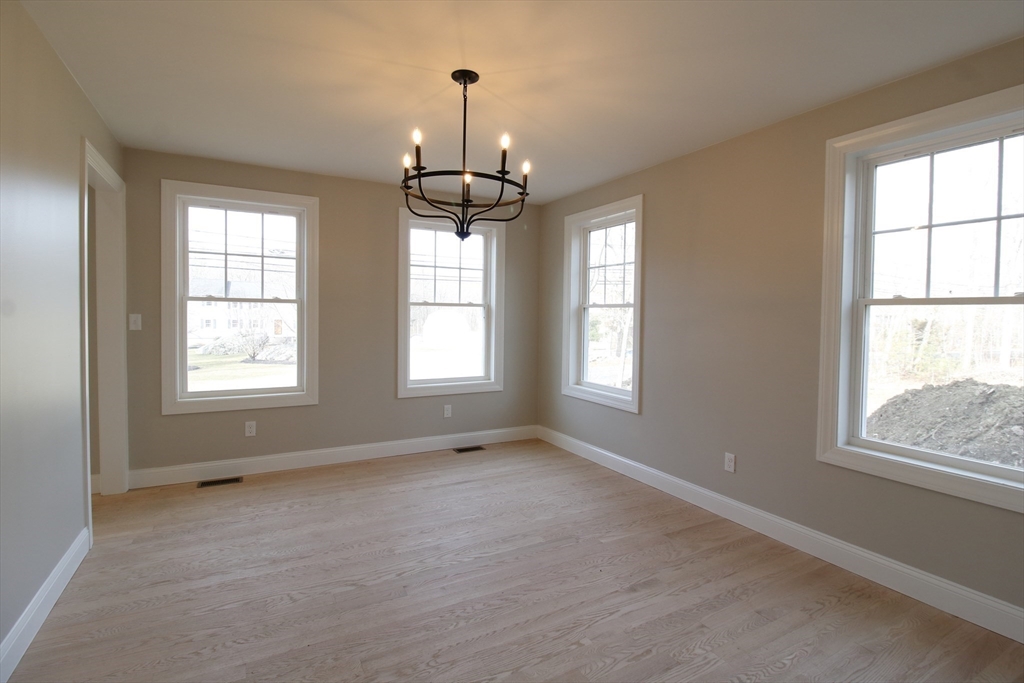 2989 Sharps Road Dighton, MA 02715 - Photo 7 of 19 a view of an empty room with a window