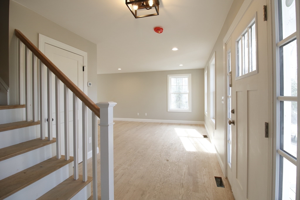 2989 Sharps Road Dighton, MA 02715 - Photo 9 of 19 a view of an entryway with wooden floor