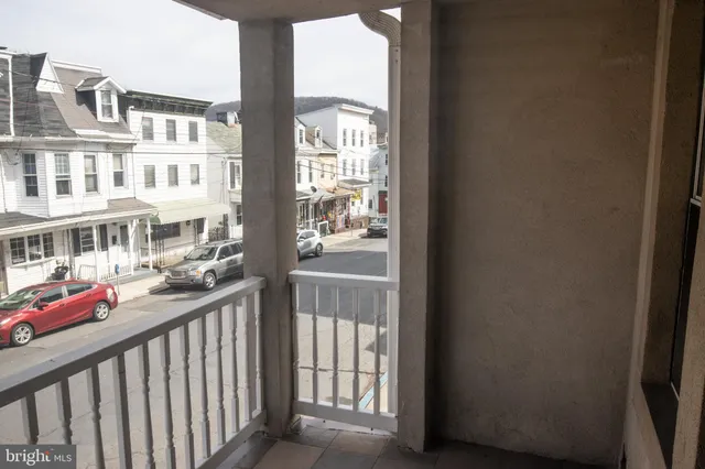 a view of an buildings from deck