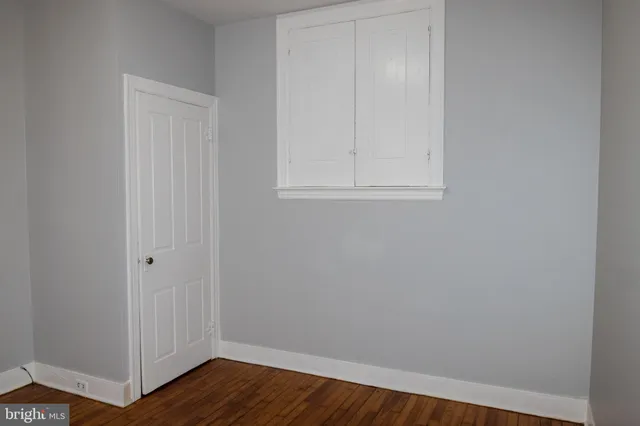 a view of small space with wooden floor