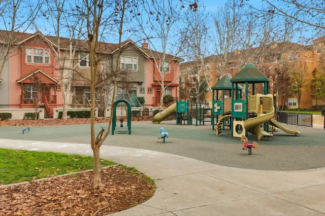 a view of a building with sitting area