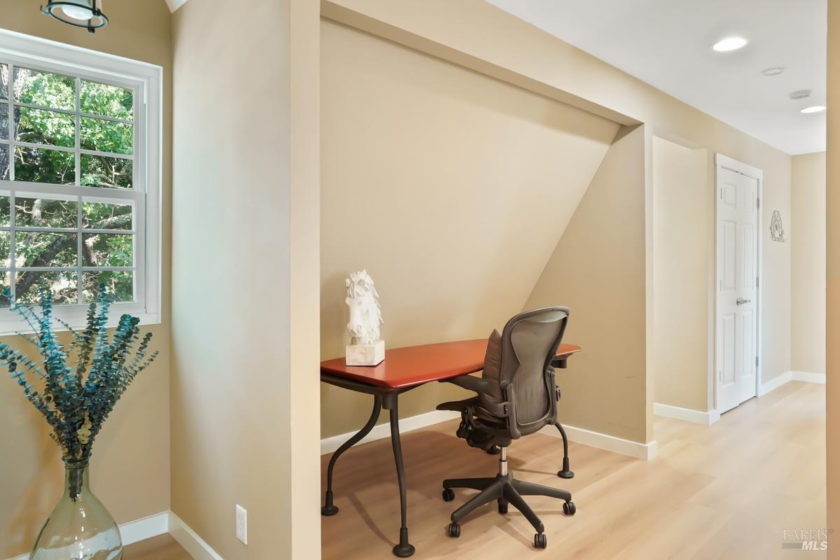 1846 Indian Valley Road, Unit A Novato, CA 94947 - Photo 32 of 45 a view of a workspace with furniture and a window