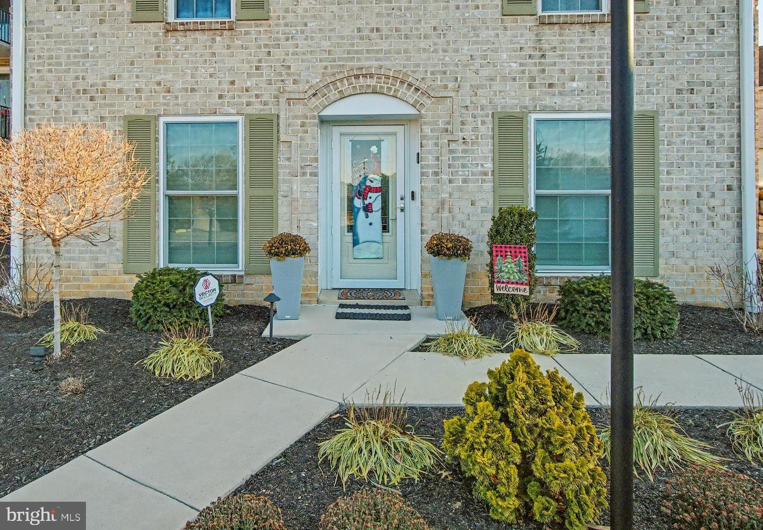 1000 Country Club Road, Unit A13 York, PA 17403 - Photo 1 of 23 a front view of a house with outdoor seating