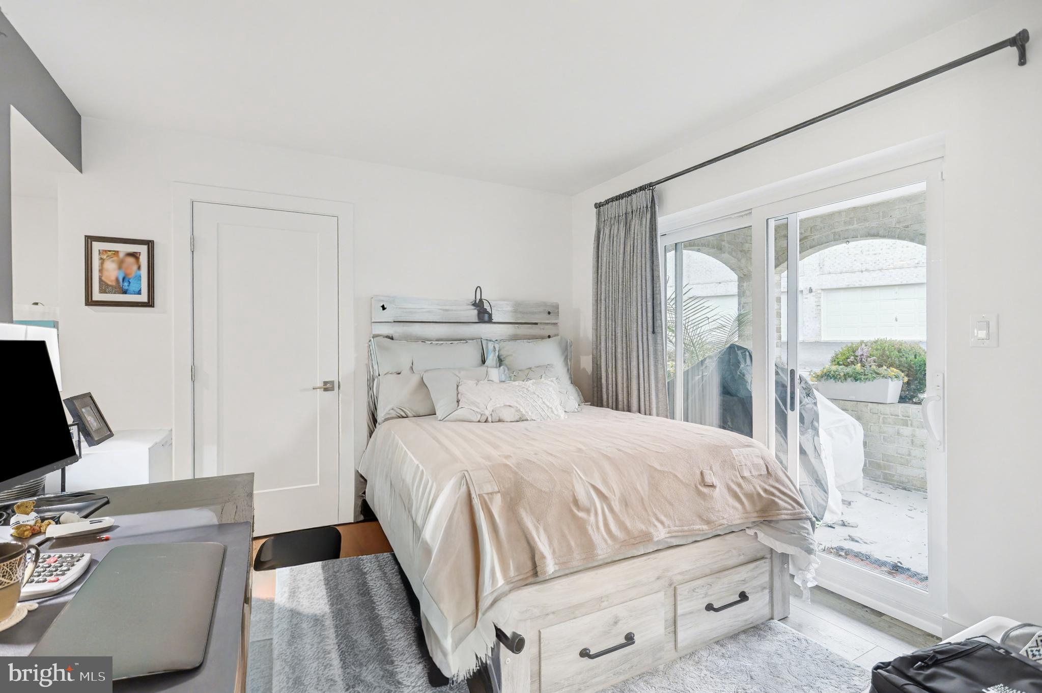 1000 Country Club Road, Unit A13 York, PA 17403 - Photo 14 of 23 a bedroom with a bed and a desk