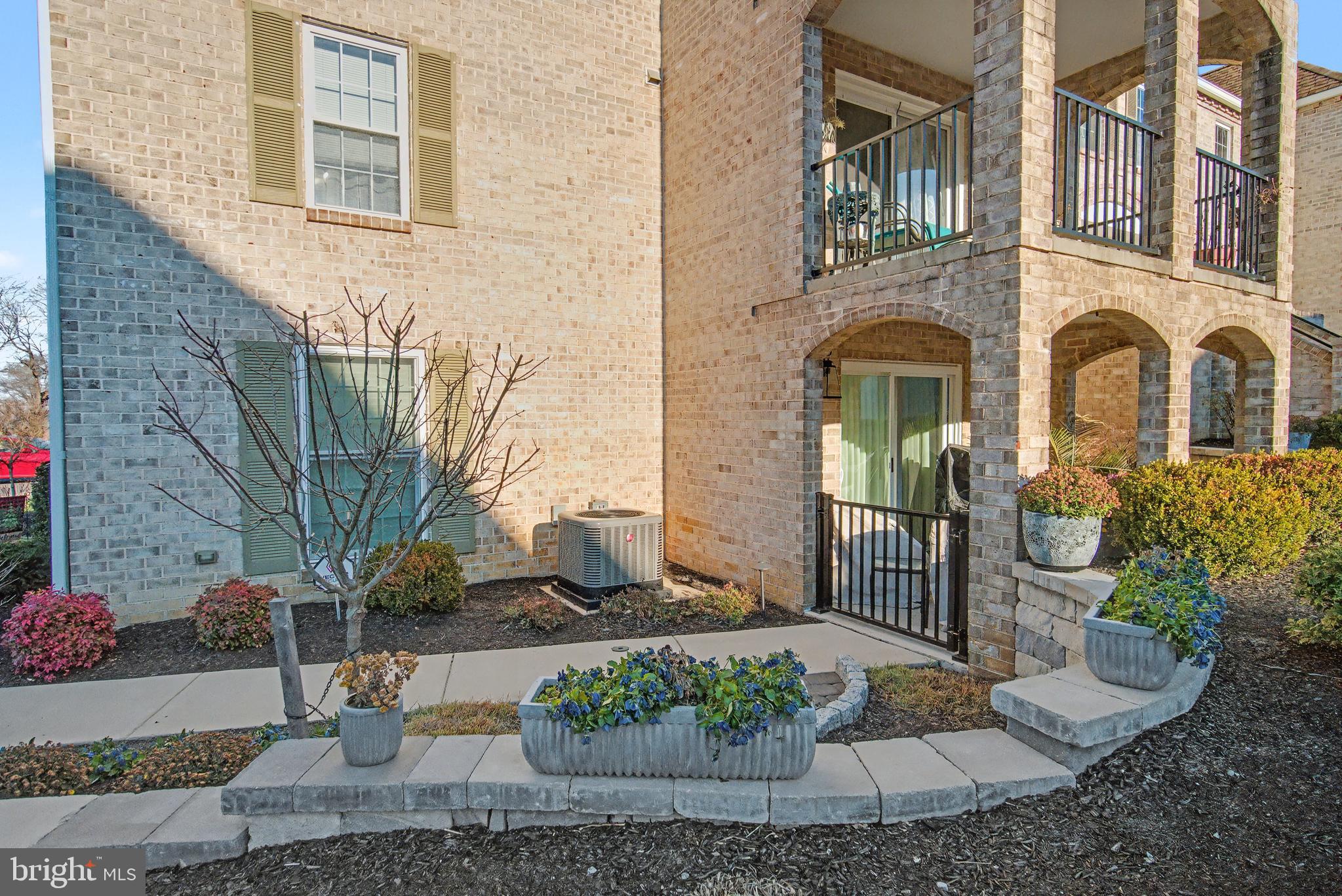 1000 Country Club Road, Unit A13 York, PA 17403 - Photo 20 of 23 a front view of a house with garden