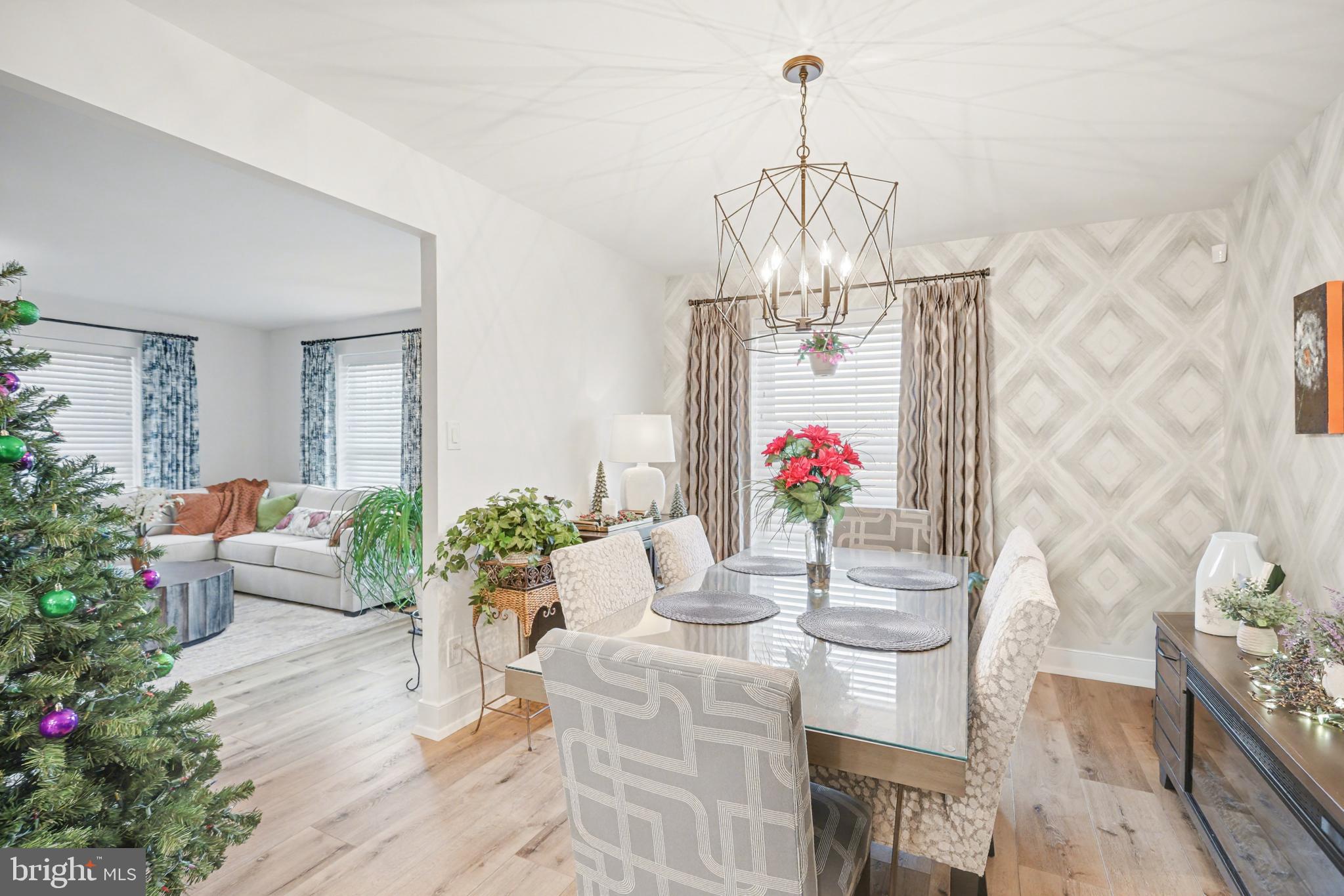 1000 Country Club Road, Unit A13 York, PA 17403 - Photo 6 of 23 a living room with furniture and flowers