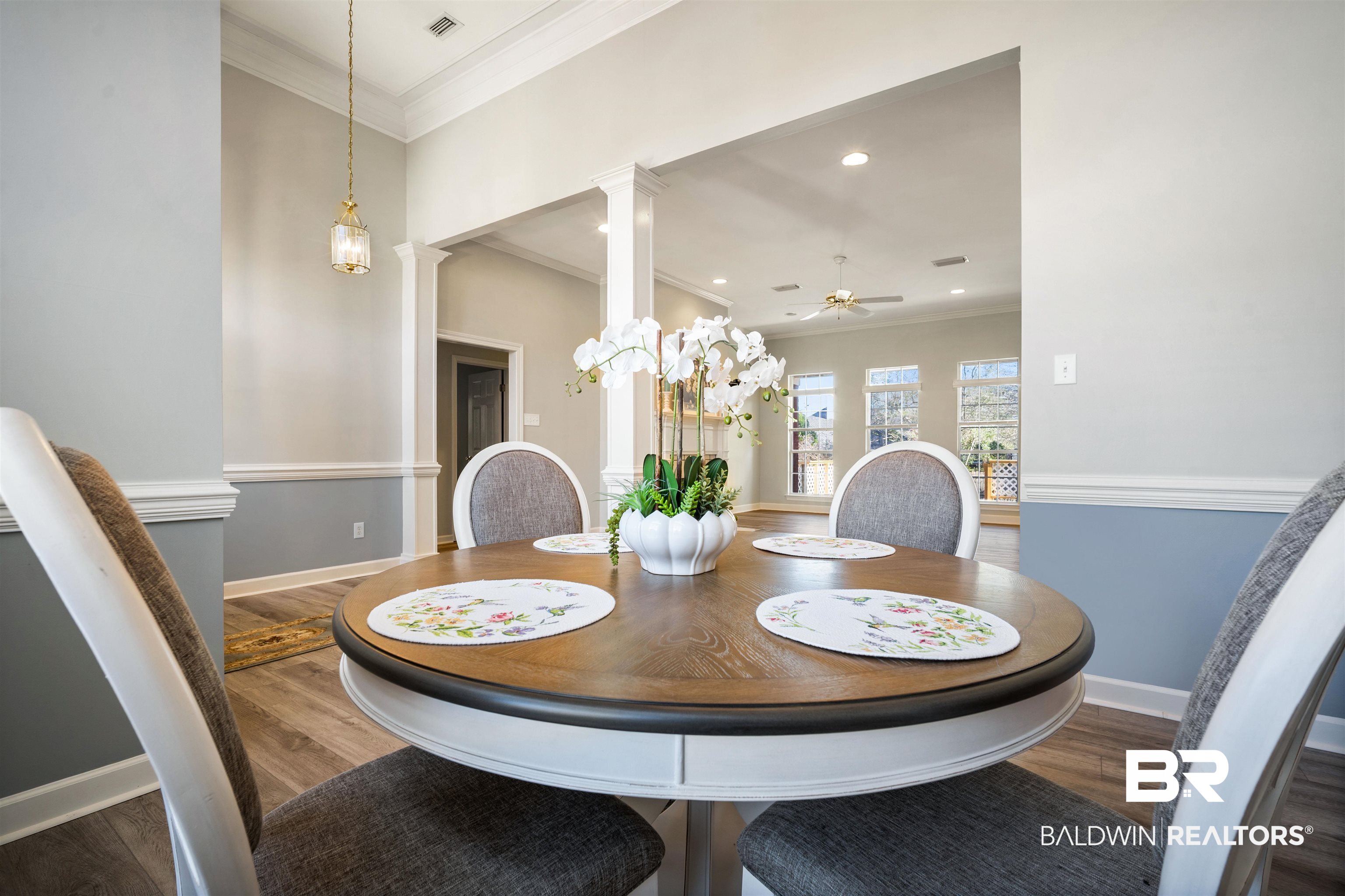 615 Summerlake Place Mobile, AL 36608 - Photo 14 of 35 Dining space featuring ornamental molding, dark wood-type flooring, ceiling fan, recessed lighting, and ornate columns