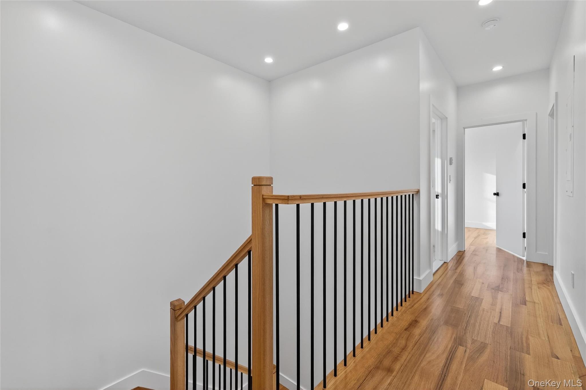 14 East Dillon Road Monticello, NY 12701 - Photo 17 of 50 a view of a hallway with wooden floor and staircase