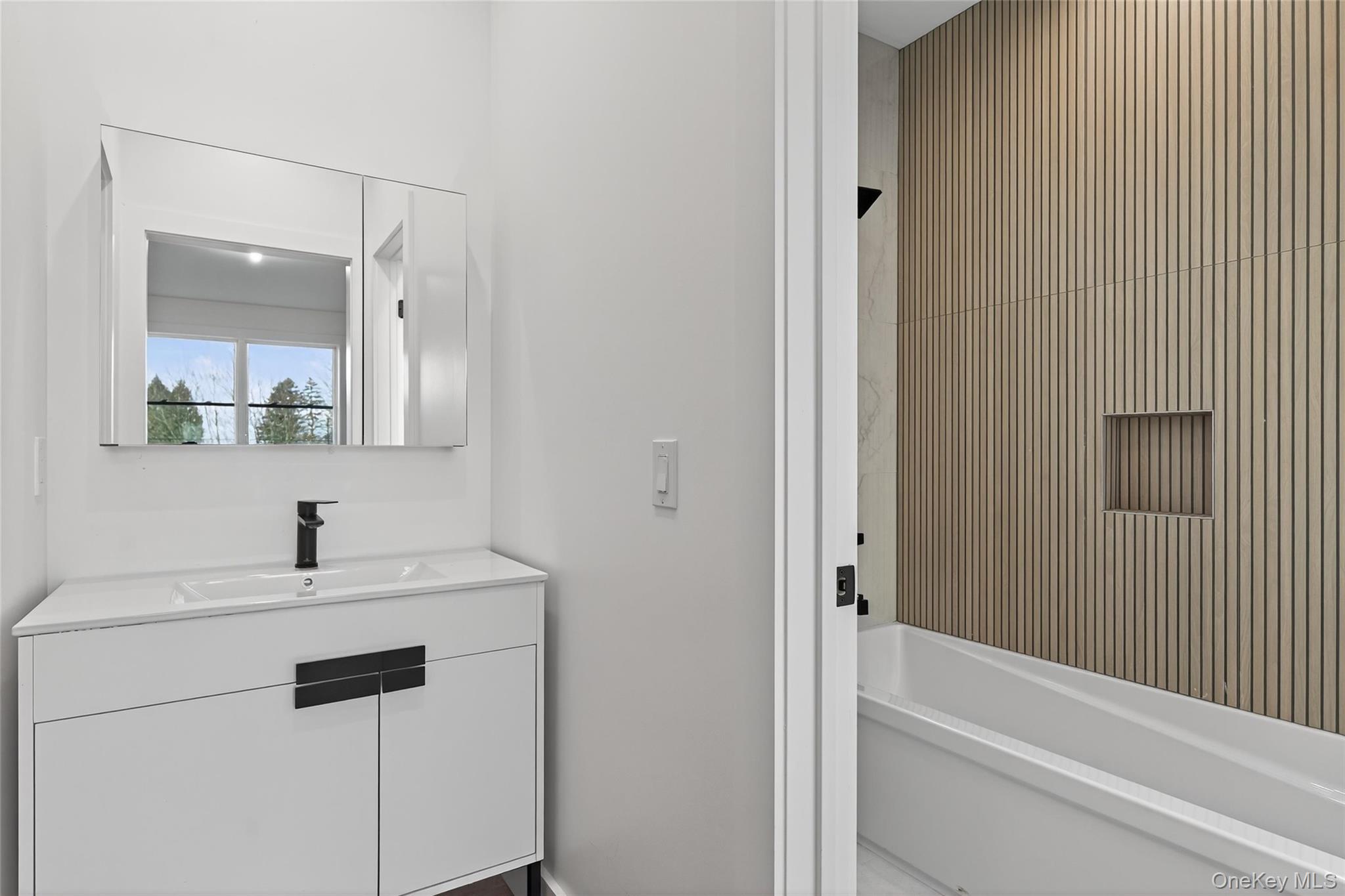 14 East Dillon Road Monticello, NY 12701 - Photo 22 of 50 Bathroom featuring vanity and shower / tub combination