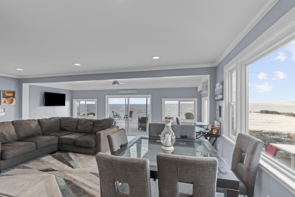 10 Silver Shell Beach Drive Fairhaven, MA 02719 - Photo 20 of 41 a living room with furniture and a large window