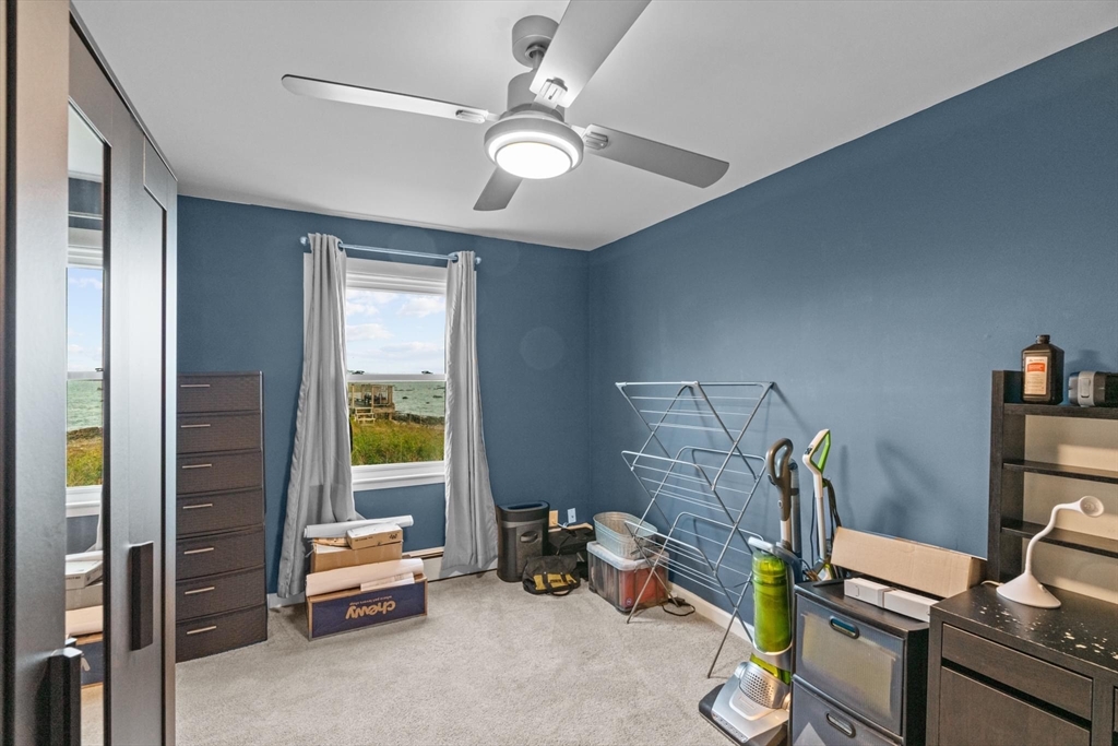 10 Silver Shell Beach Drive Fairhaven, MA 02719 - Photo 23 of 41 a room with furniture and a window