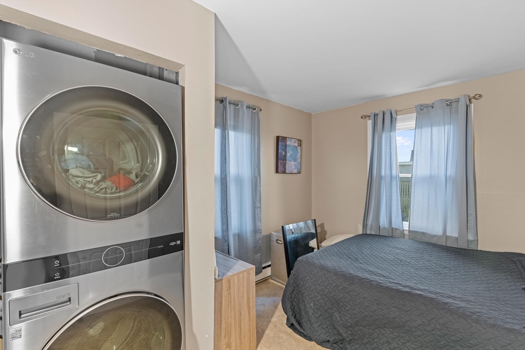 10 Silver Shell Beach Drive Fairhaven, MA 02719 - Photo 24 of 41 a bed room with a bed and a washer