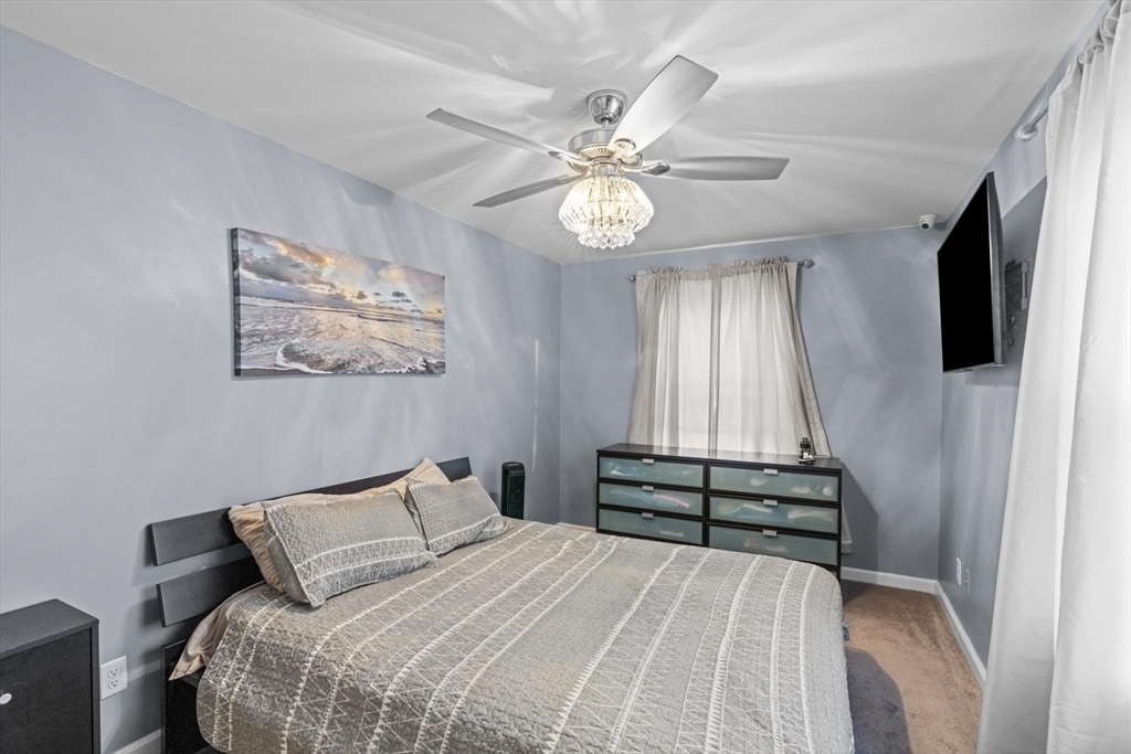 10 Silver Shell Beach Drive Fairhaven, MA 02719 - Photo 26 of 41 a bedroom with a bed and a window