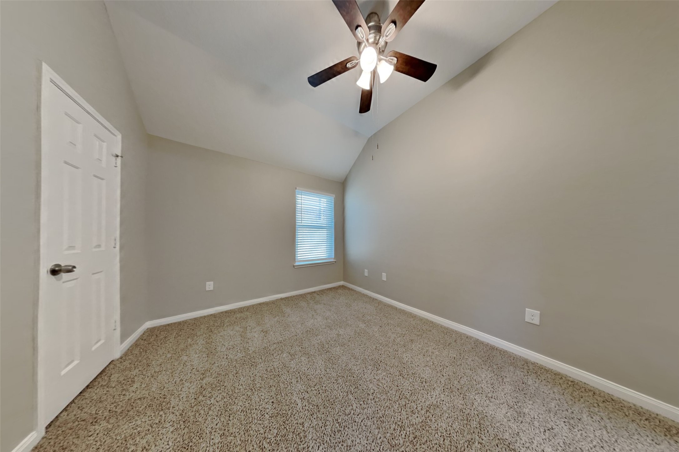 8226 Point Pendleton Drive Tomball, TX 77375 - Photo 12 of 19 an empty room with windows and fan