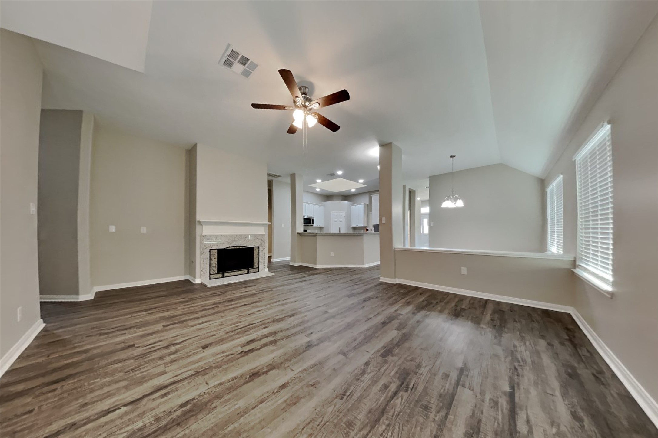 8226 Point Pendleton Drive Tomball, TX 77375 - Photo 2 of 19 a view of a room wooden floor and a kitchen