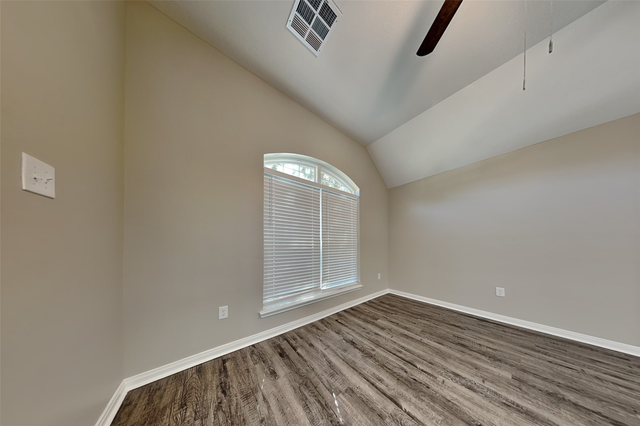 8226 Point Pendleton Drive Tomball, TX 77375 - Photo 4 of 19 an empty room with wooden floor and windows