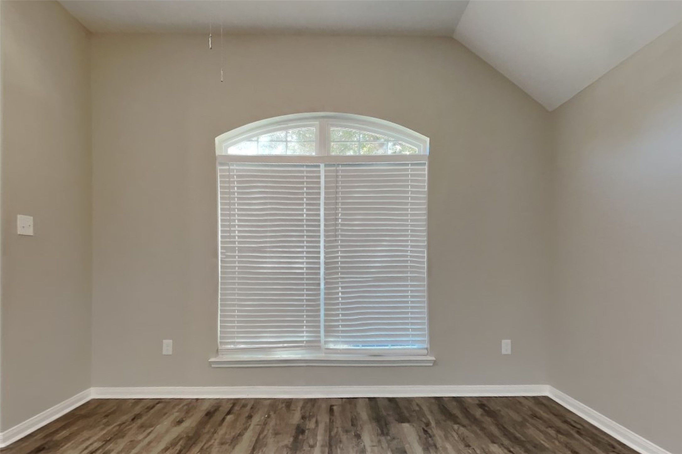 8226 Point Pendleton Drive Tomball, TX 77375 - Photo 7 of 19 a view of a small space with wooden floor and a window