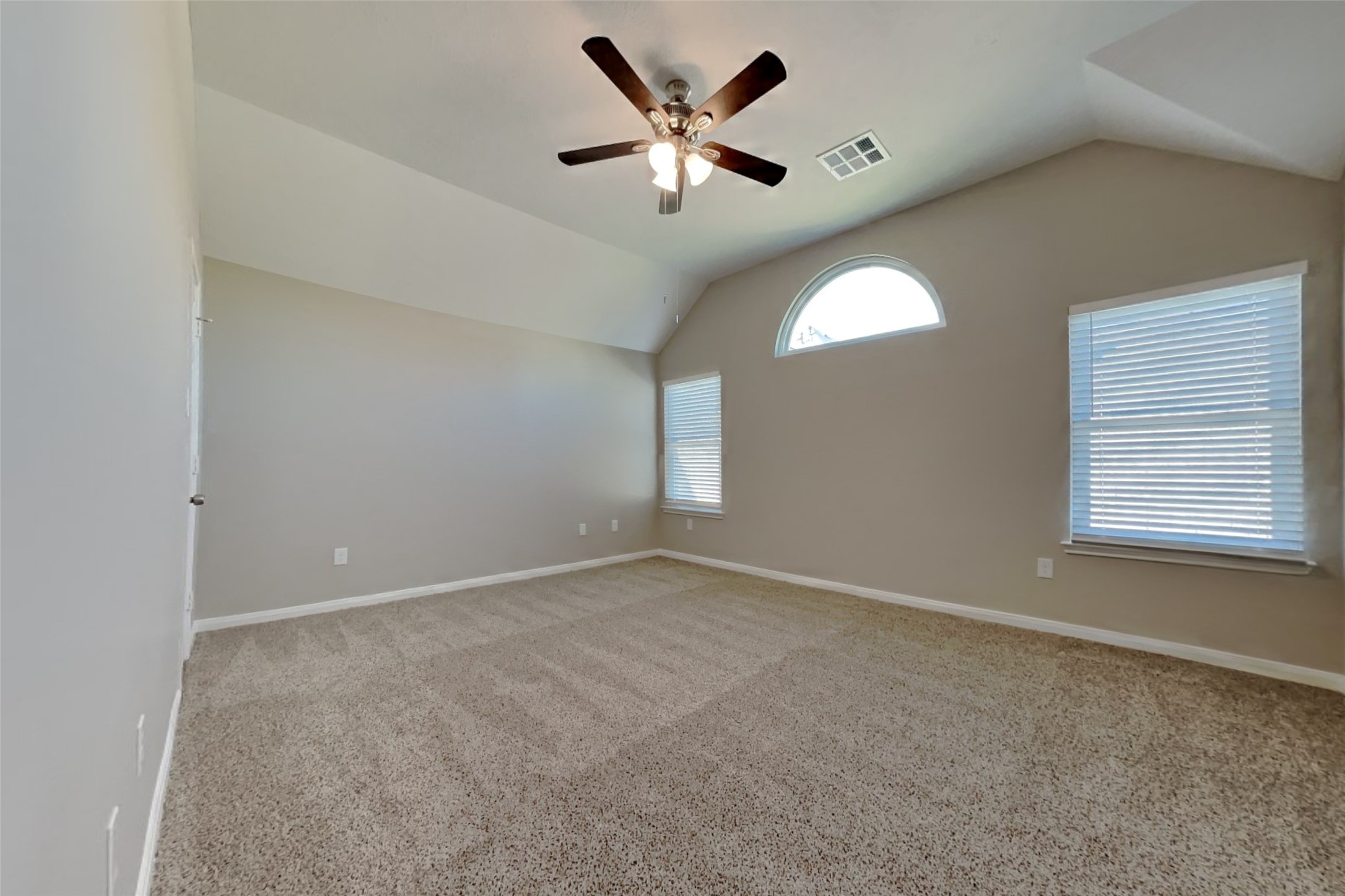 8226 Point Pendleton Drive Tomball, TX 77375 - Photo 8 of 19 an empty room with window and chandelier fan
