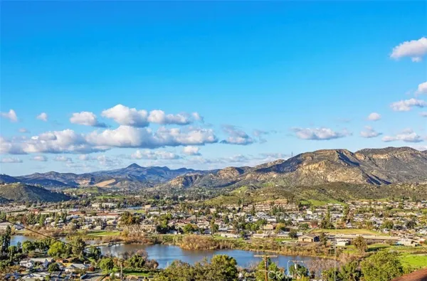 a view of a city with mountains in the background