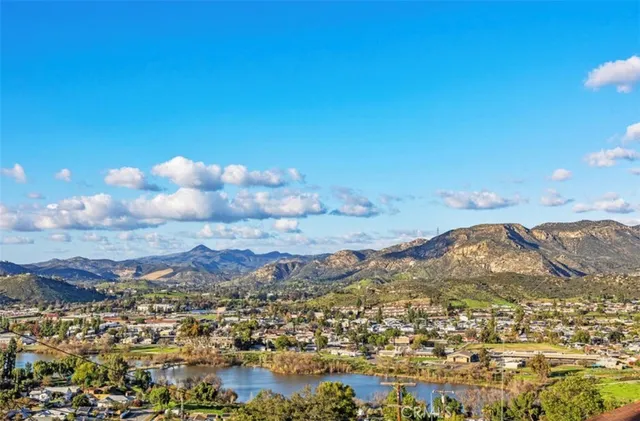 a view of a city with mountains in the background