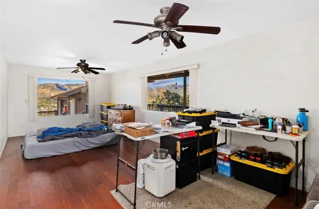 a work room with furniture and gym equipment