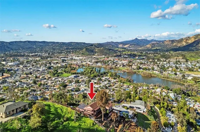 a view of a city with mountains in the background