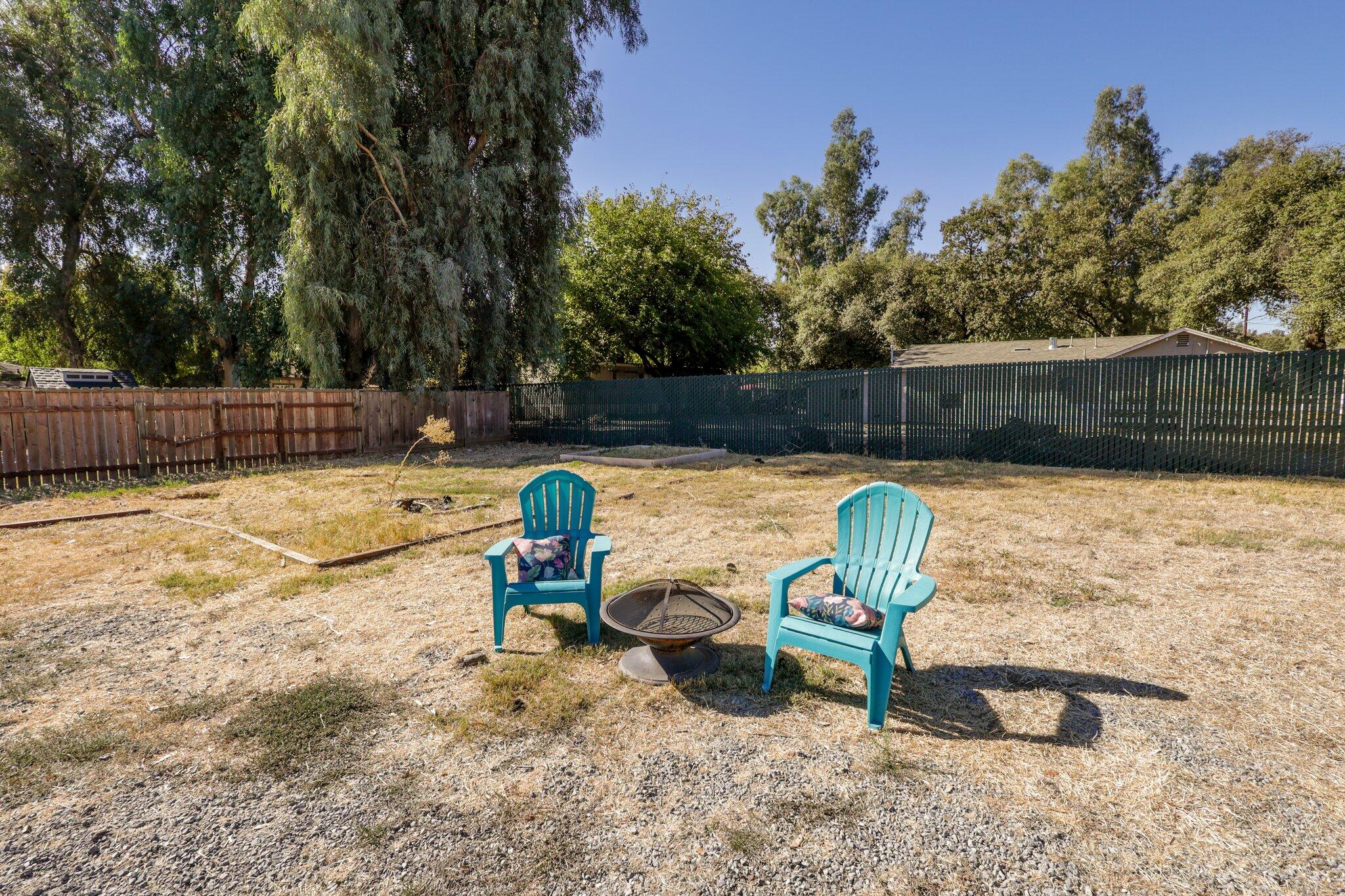 7699 Happy Valley Road Anderson, CA 96007 - Photo 14 of 49 a view of a swimming pool with a lounge chair
