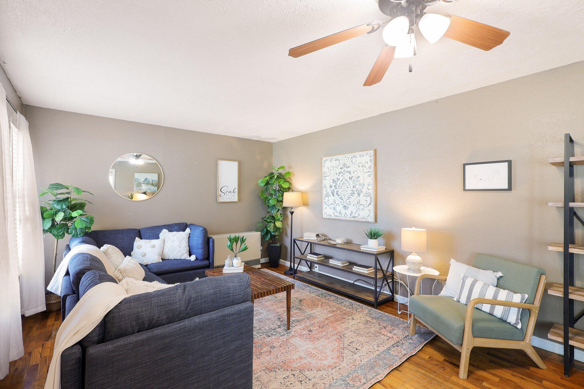 7699 Happy Valley Road Anderson, CA 96007 - Photo 23 of 49 a living room with furniture and a chandelier