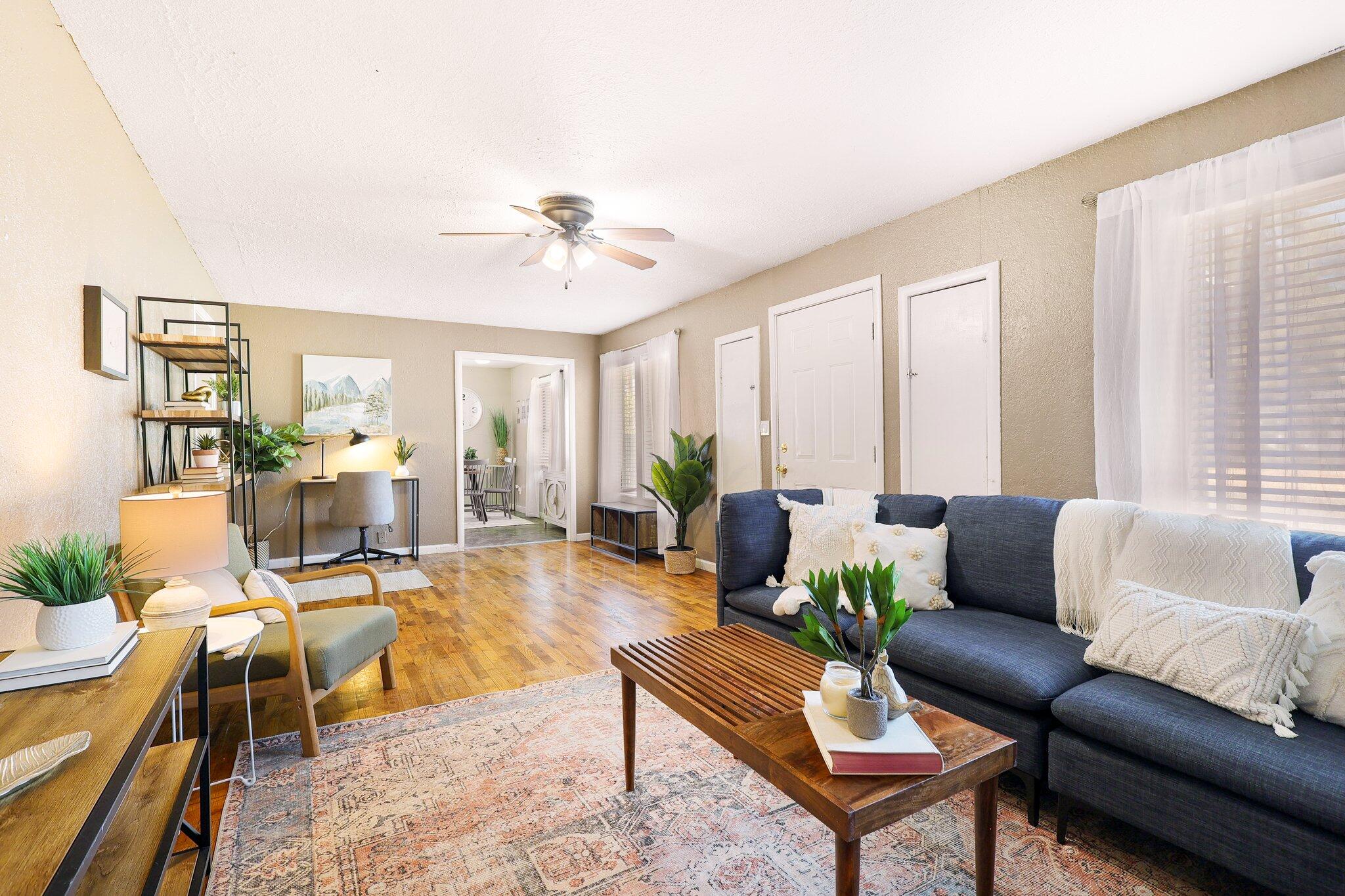 7699 Happy Valley Road Anderson, CA 96007 - Photo 3 of 49 a living room with furniture potted plant and a large window