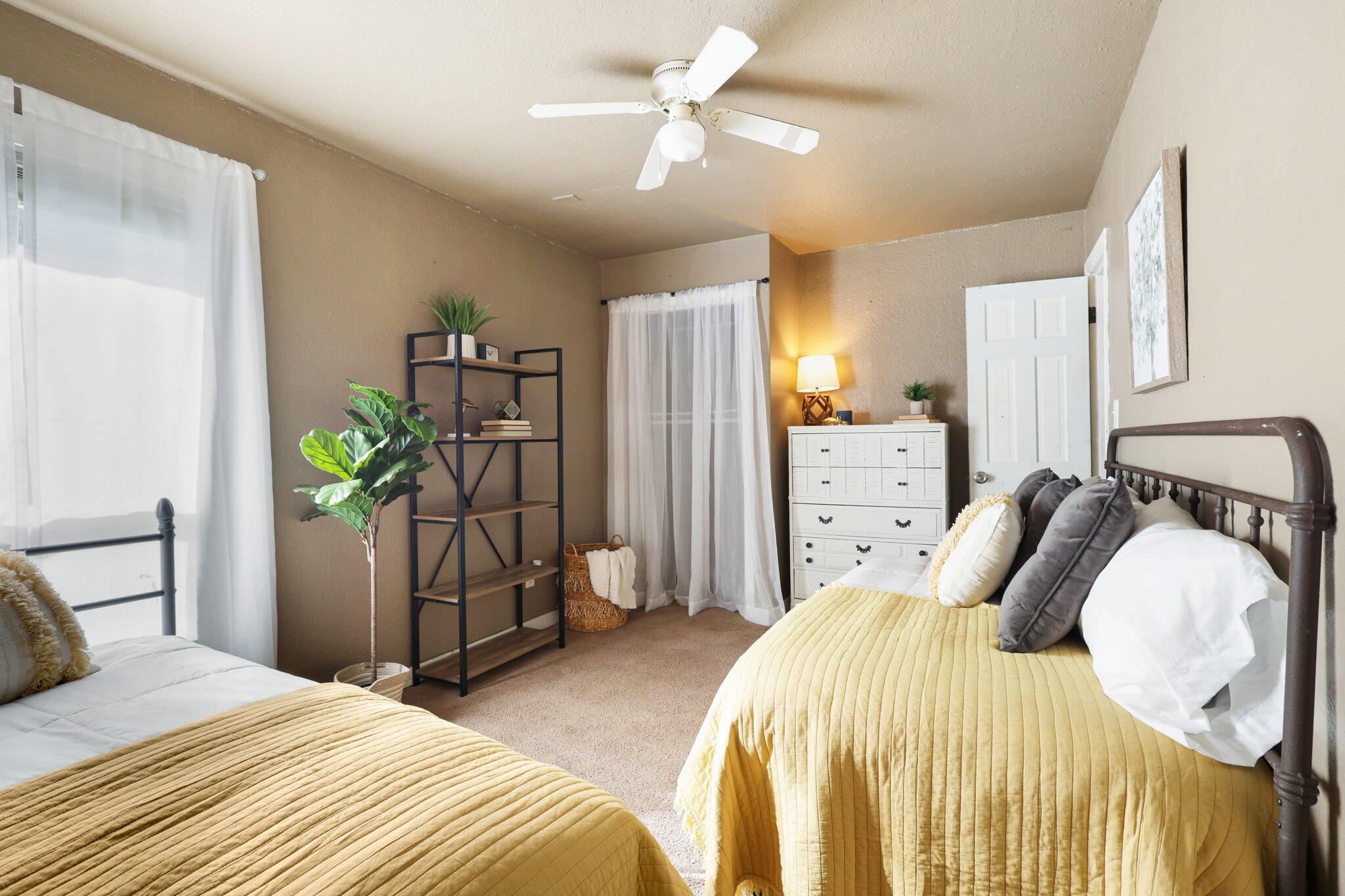 7699 Happy Valley Road Anderson, CA 96007 - Photo 31 of 49 a bedroom with a bed dresser and a window