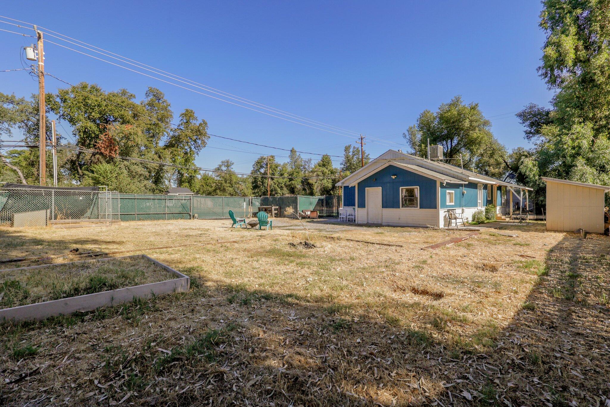 7699 Happy Valley Road Anderson, CA 96007 - Photo 34 of 49 a front view of a house with a yard