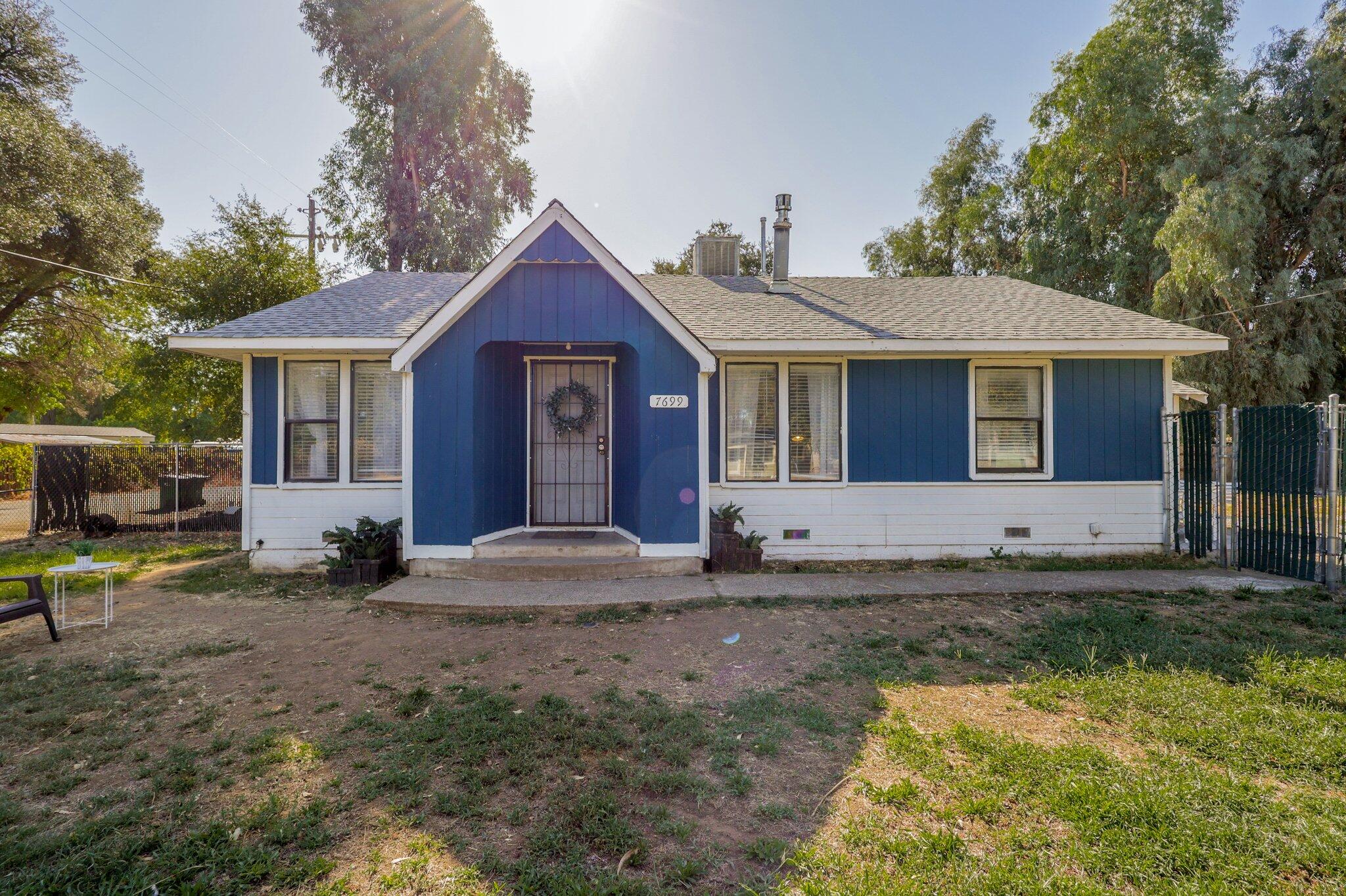 7699 Happy Valley Road Anderson, CA 96007 - Photo 36 of 49 a front view of a house with a yard