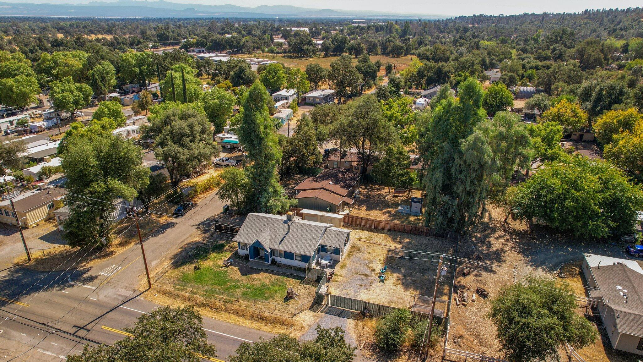7699 Happy Valley Road Anderson, CA 96007 - Photo 44 of 49 an aerial view of a house with a yard