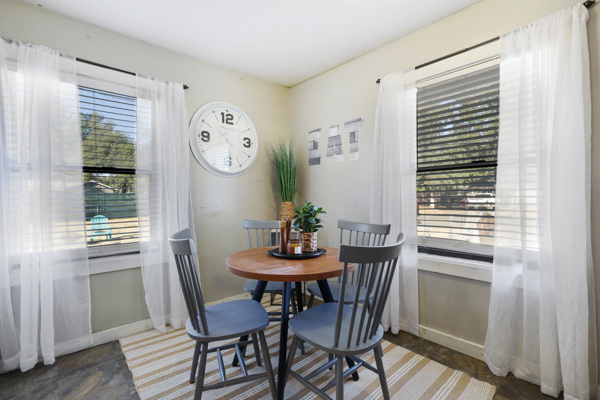 7699 Happy Valley Road Anderson, CA 96007 - Photo 5 of 49 a dining room with furniture and window