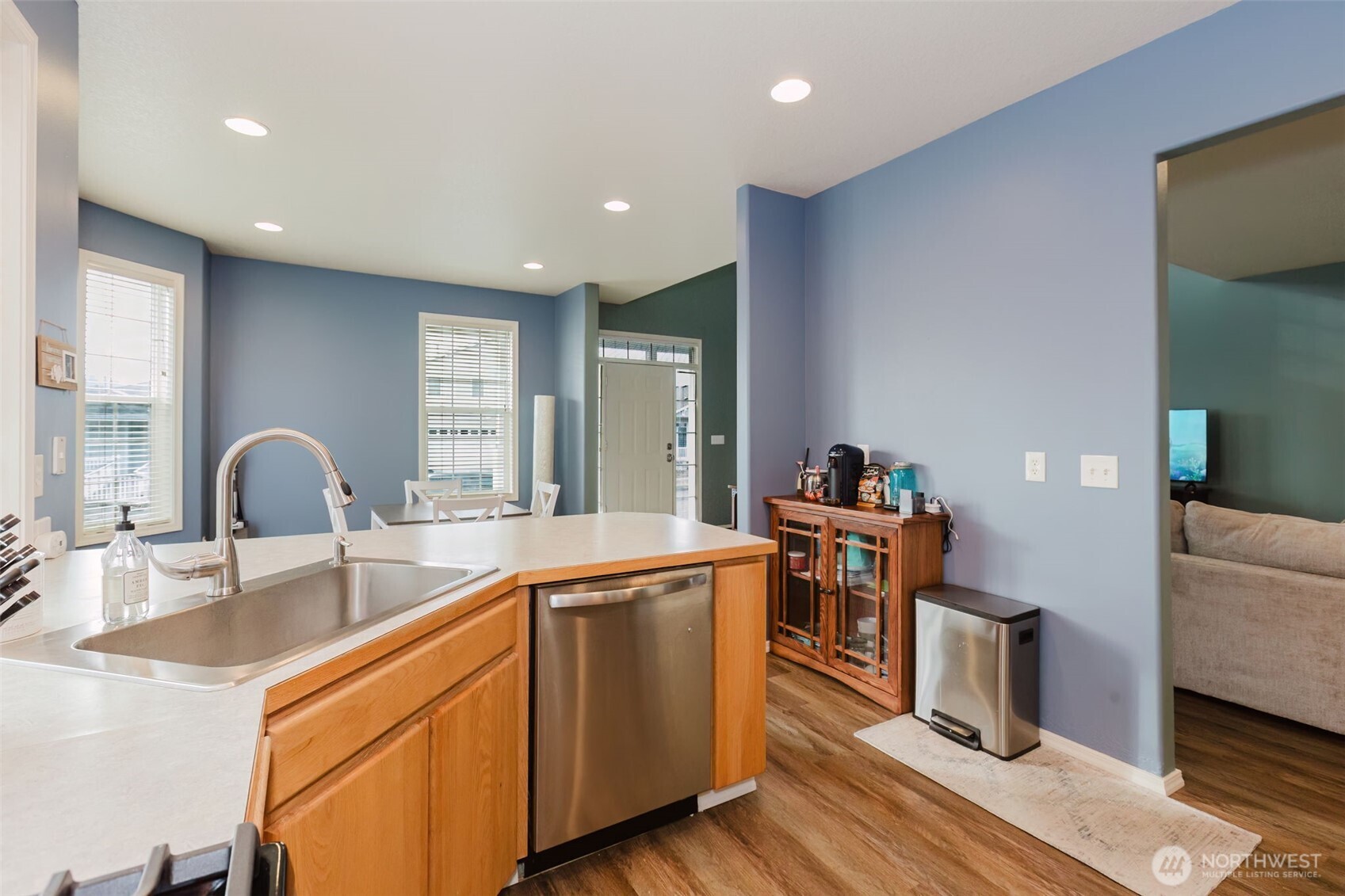 8324 Sweetbrier Loop Southeast Olympia, WA 98513 - Photo 15 of 39 a kitchen with stainless steel appliances granite countertop a sink and stove
