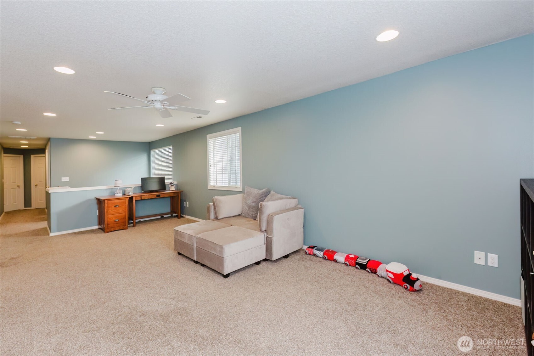 8324 Sweetbrier Loop Southeast Olympia, WA 98513 - Photo 17 of 39 a living room with furniture and white walls