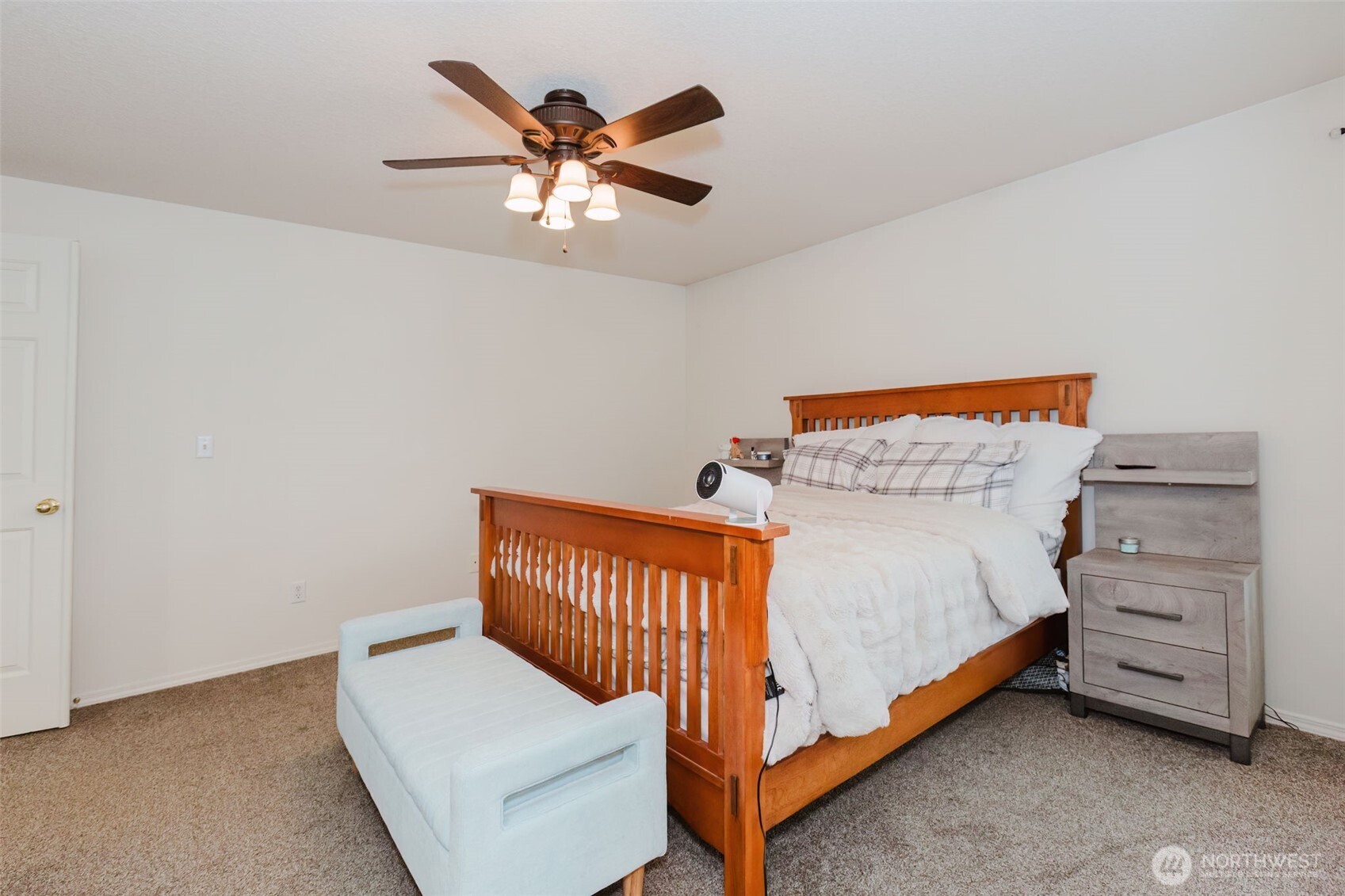 8324 Sweetbrier Loop Southeast Olympia, WA 98513 - Photo 20 of 39 a bedroom with a bed and a chandelier