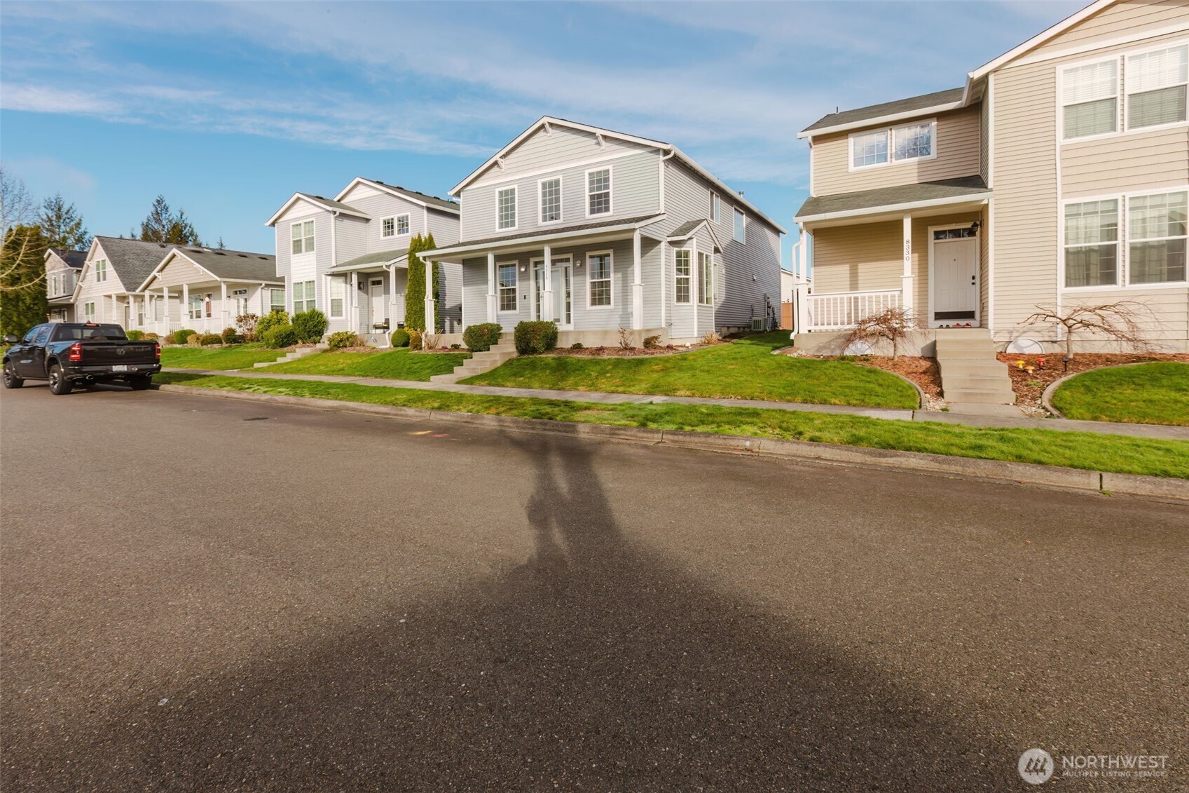 8324 Sweetbrier Loop Southeast Olympia, WA 98513 - Photo 2 of 39 a view of a street with houses