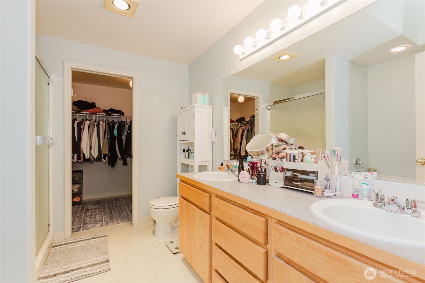 8324 Sweetbrier Loop Southeast Olympia, WA 98513 - Photo 23 of 39 a bathroom with a sink a toilet and shower